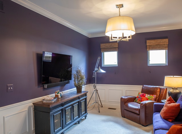 5514 Woodfall Rd, Clarkston, MI 48348 - living area featuring carpet, plenty of natural light, a wainscoted wall, ornamental molding, and a chandelier