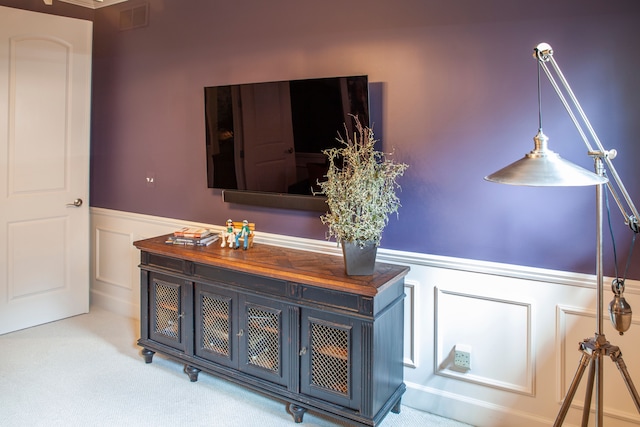 5514 Woodfall Rd, Clarkston, MI 48348 - detailed view of a wainscoted wall, a decorative wall, and carpet flooring