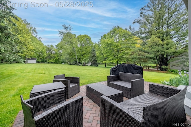 105 Crescent Hill Dr, Ortonville, MI 48462 - view of patio / terrace with an outdoor living space, grilling area, and view of scattered trees
