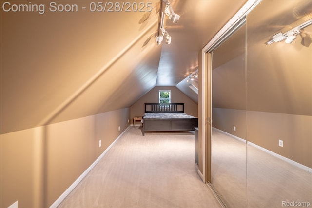 105 Crescent Hill Dr, Ortonville, MI 48462 - unfurnished bedroom featuring lofted ceiling, carpet flooring, and baseboards