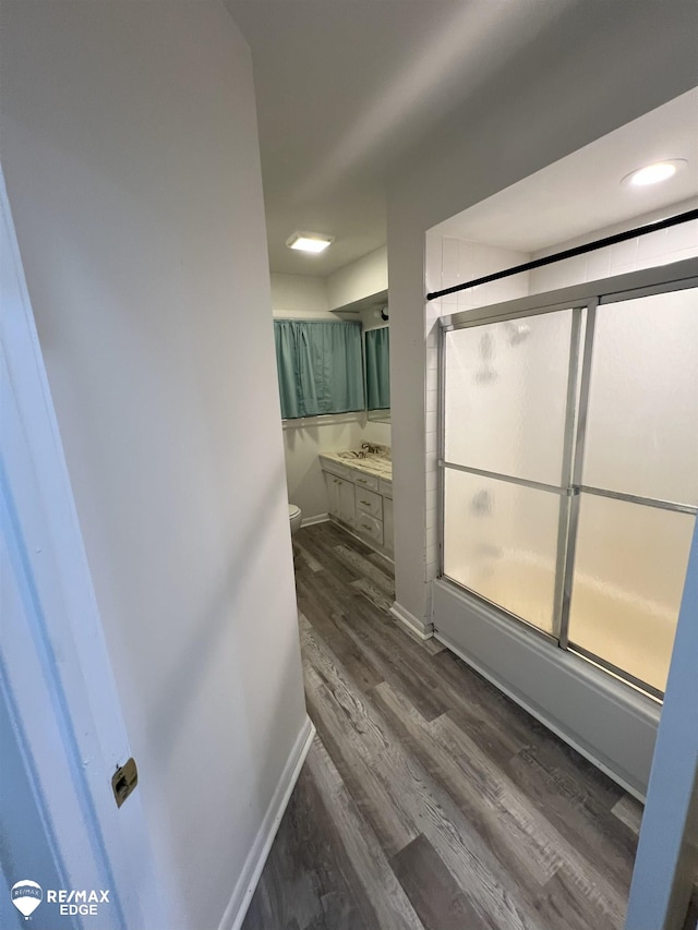 1132 Wisner St, Mount Morris, MI 48458 - full bathroom featuring wood finished floors and vanity
