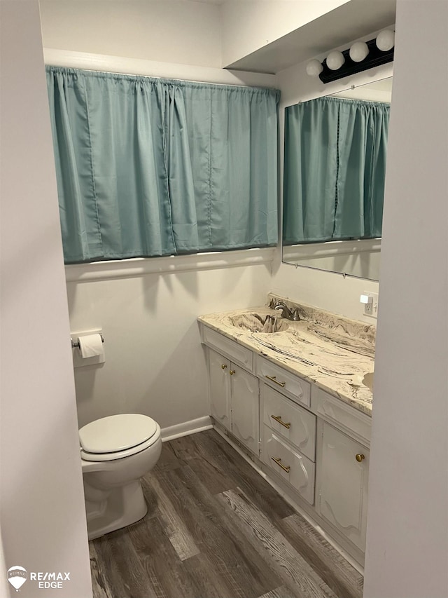 1132 Wisner St, Mount Morris, MI 48458 - bathroom featuring vanity and wood finished floors