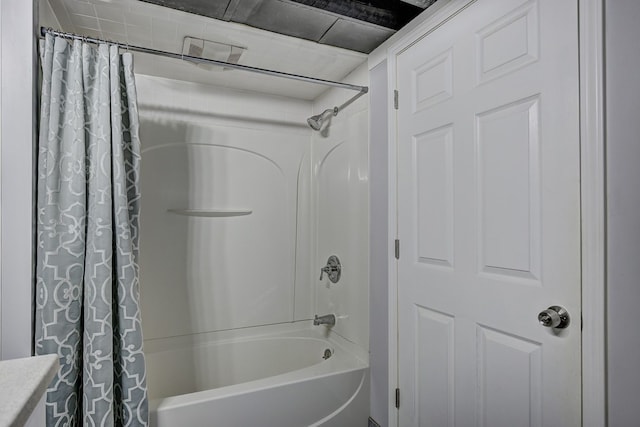 full bathroom featuring shower / bath combination with curtain