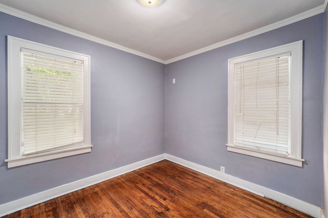 22619 Santa Maria St, Detroit, MI 48219 - spare room with baseboards, dark wood-type flooring, and ornamental molding