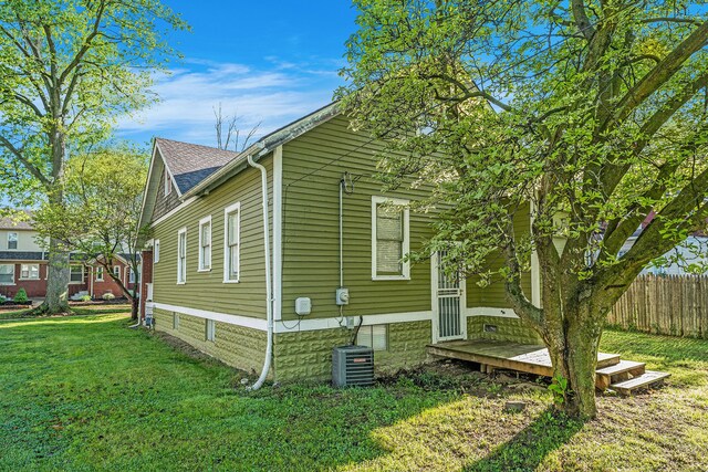 22619 Santa Maria St, Detroit, MI 48219 - view of property exterior with central AC unit and a shingled roof