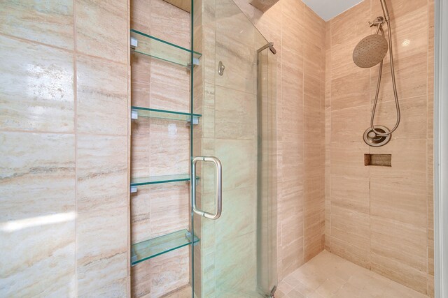 full bathroom with a stall shower