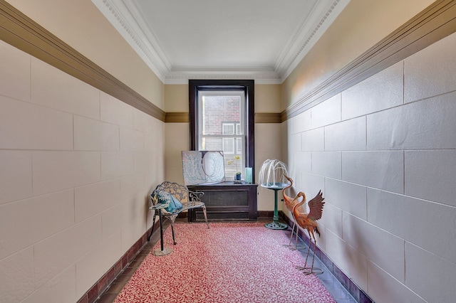 sitting room with ornamental molding