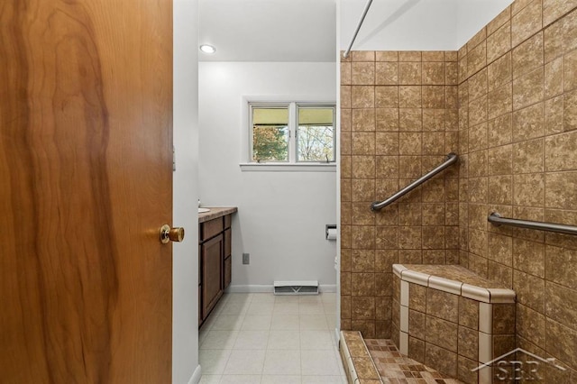301 W Fourth St, Gladwin, MI 48624 - full bath with a walk in shower, vanity, tile patterned flooring, baseboards, and recessed lighting