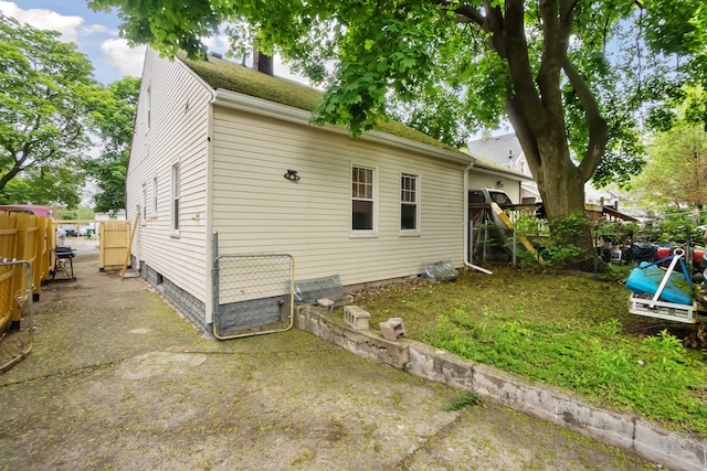 1430 New York Ave, Lansing, MI 48906 - rear view of house with fence
