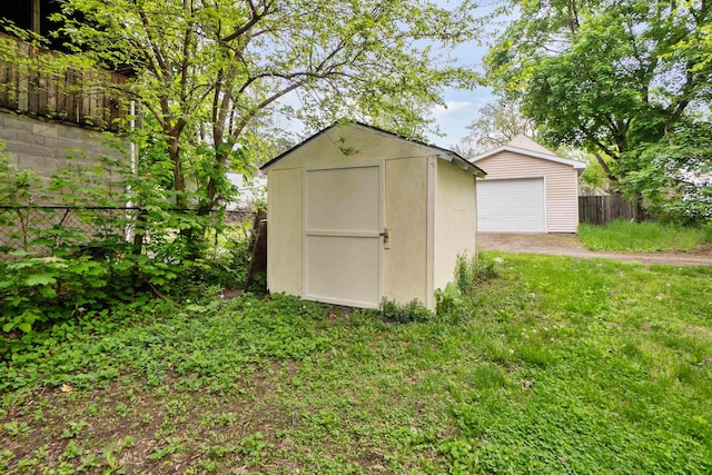 1430 New York Ave, Lansing, MI 48906 - view of shed featuring fence