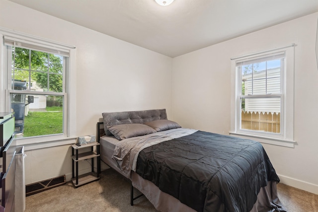 1430 New York Ave, Lansing, MI 48906 - carpeted bedroom with baseboards