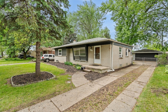9319 Merriman Rd, Livonia, MI 48150 - view of front of property featuring brick siding and a chimney