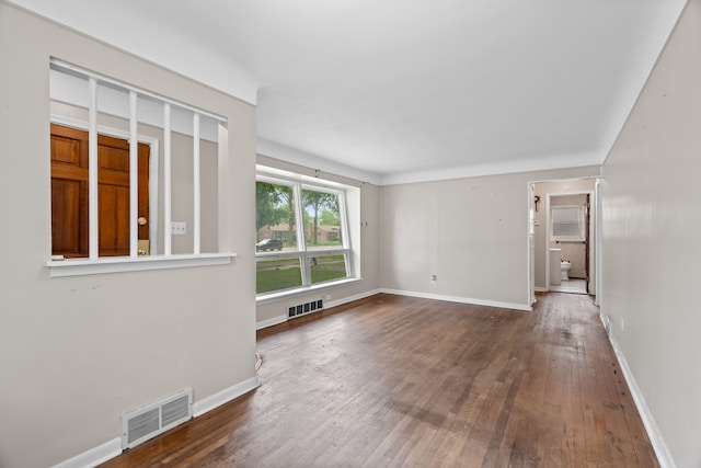 9319 Merriman Rd, Livonia, MI 48150 - unfurnished room featuring hardwood / wood-style flooring and baseboards