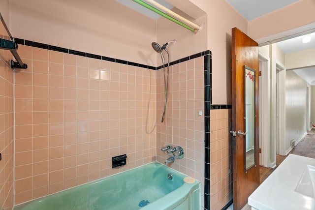 9319 Merriman Rd, Livonia, MI 48150 - full bath with tub / shower combination and wood finished floors