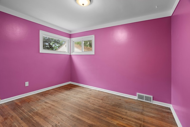 9319 Merriman Rd, Livonia, MI 48150 - unfurnished room featuring baseboards and wood-type flooring