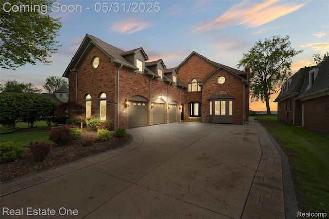 48556 Harbor Dr, Chesterfield, MI 48047 - view of front facade featuring driveway, brick siding, an attached garage, and a yard