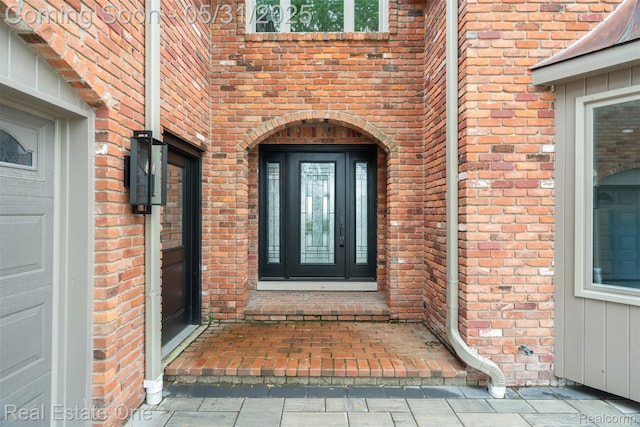 48556 Harbor Dr, Chesterfield, MI 48047 - doorway to property featuring brick siding