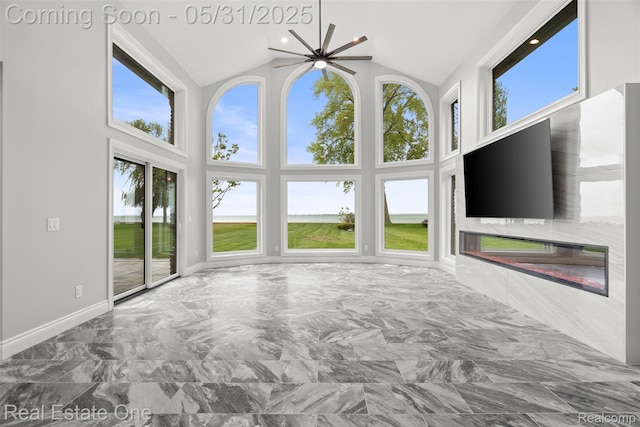 48556 Harbor Dr, Chesterfield, MI 48047 - unfurnished bedroom featuring multiple windows, access to exterior, marble finish flooring, and high vaulted ceiling