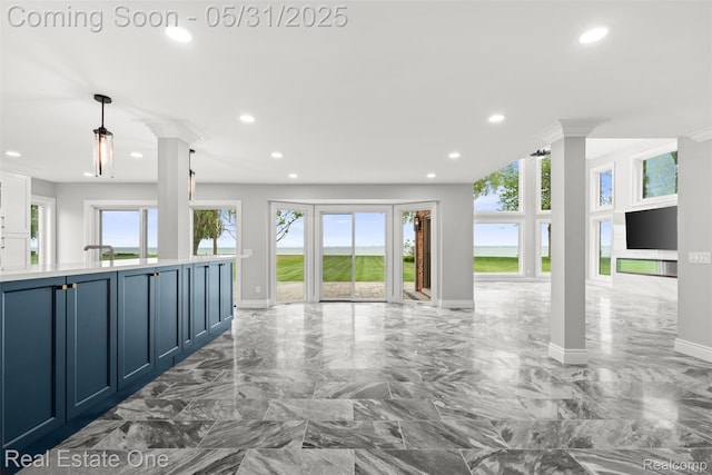 48556 Harbor Dr, Chesterfield, MI 48047 - unfurnished living room featuring ornate columns, recessed lighting, baseboards, and marble tiled flooring