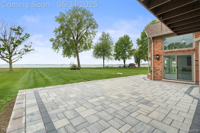 48556 Harbor Dr, Chesterfield, MI 48047 - view of patio / terrace with a water view