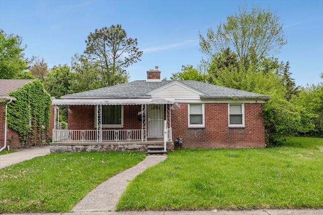 9035 Braile St, Detroit, MI 48228 - bungalow-style home featuring a porch, a front yard, a chimney, brick siding, and roof with shingles