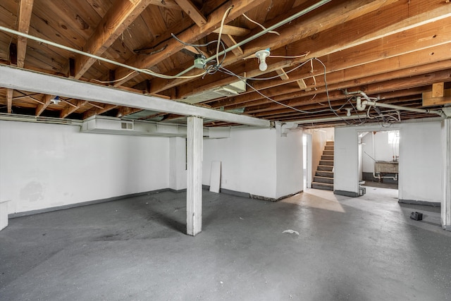 9035 Braile St, Detroit, MI 48228 - below grade area with stairs and baseboards