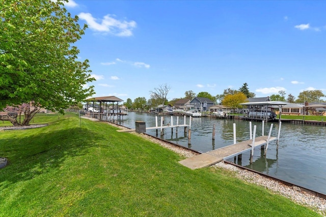 30617 Young Dr, Gibraltar, MI 48173 - dock with a water view, a lawn, and a residential view