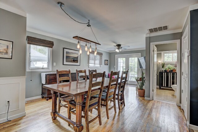 2230 Princeton Rd, Berkley, MI 48072 - dining space featuring light wood finished floors, ceiling fan, ornamental molding, and baseboards