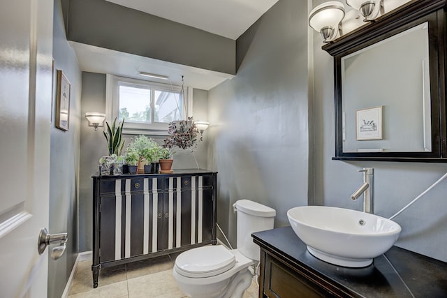 2230 Princeton Rd, Berkley, MI 48072 - half bathroom with vanity, tile patterned floors, toilet, and baseboards