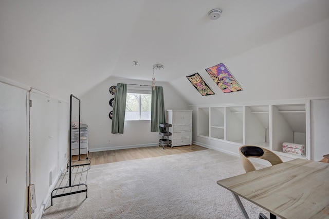2230 Princeton Rd, Berkley, MI 48072 - additional living space with light colored carpet, lofted ceiling, light wood-style flooring, an office area, and baseboards