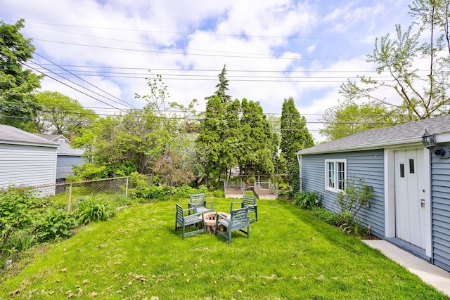 2230 Princeton Rd, Berkley, MI 48072 - view of yard featuring an outdoor fire pit