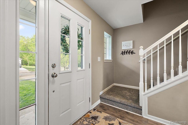 457 Cove View Dr, Waterford, MI 48327 - foyer featuring stairway, wood finished floors, and baseboards