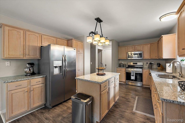 457 Cove View Dr, Waterford, MI 48327 - kitchen featuring stainless steel appliances, a sink, dark wood-style flooring, and light stone counters