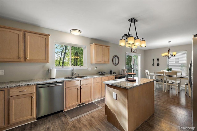 457 Cove View Dr, Waterford, MI 48327 - kitchen with stainless steel dishwasher, a sink, a chandelier, light brown cabinets, and a center island