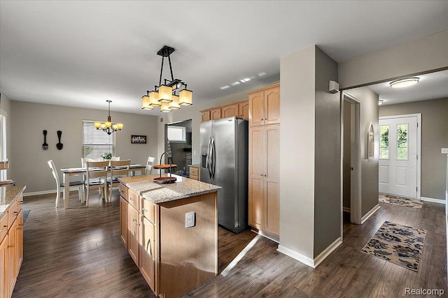 457 Cove View Dr, Waterford, MI 48327 - kitchen with stainless steel fridge, a chandelier, a center island, and baseboards