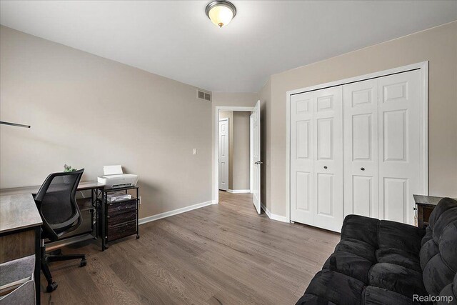 457 Cove View Dr, Waterford, MI 48327 - office featuring wood finished floors and baseboards