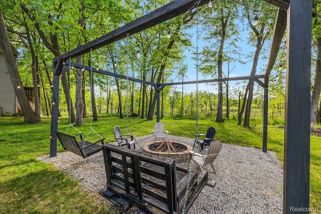 457 Cove View Dr, Waterford, MI 48327 - view of patio with a fire pit