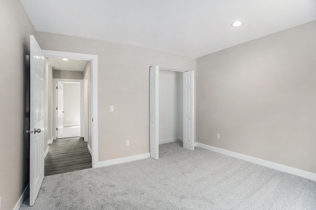 5203 NE Myers Rd, Kalkaska, MI 49646 - unfurnished bedroom featuring carpet, baseboards, recessed lighting, and a closet
