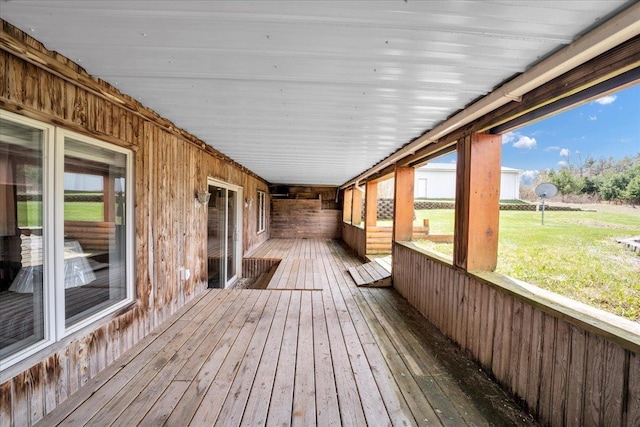 deck featuring a yard