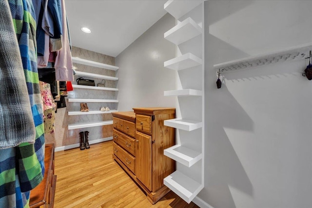 spacious closet featuring light wood-style floors