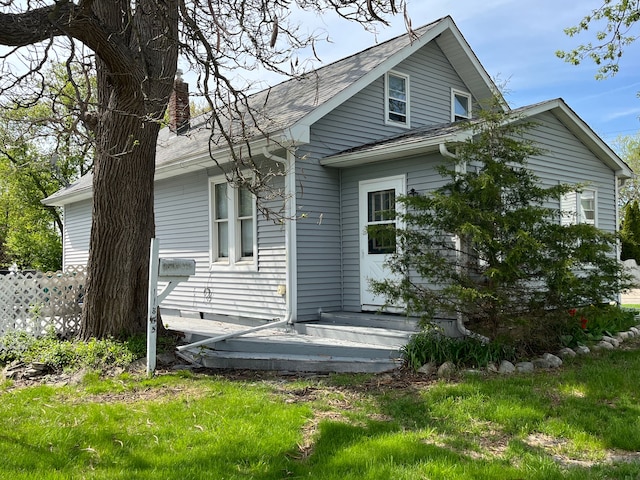11855 Temperance St, Mount Morris, MI 48458 - back of property with a chimney