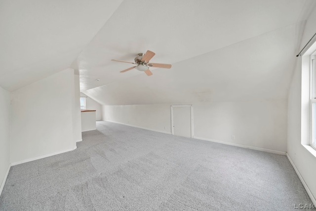 1107 Sunset Dr, Tecumseh, MI 49286 - bonus room featuring vaulted ceiling, carpet floors, a ceiling fan, and baseboards