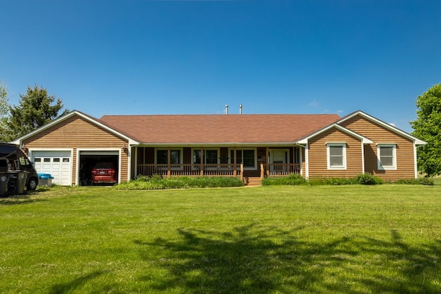 34699 Fuerstenau Rd, Richmond, MI 48062 - ranch-style house featuring covered porch, a garage, and a front yard