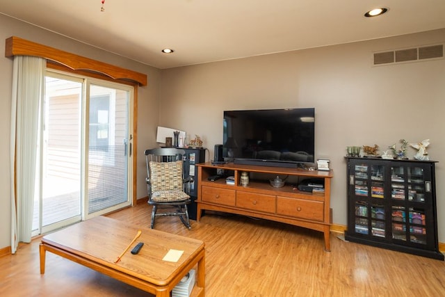 34699 Fuerstenau Rd, Richmond, MI 48062 - living area with wood finished floors, recessed lighting, and baseboards