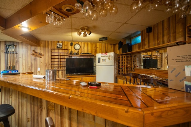 34699 Fuerstenau Rd, Richmond, MI 48062 - living room with wood walls and a drop ceiling