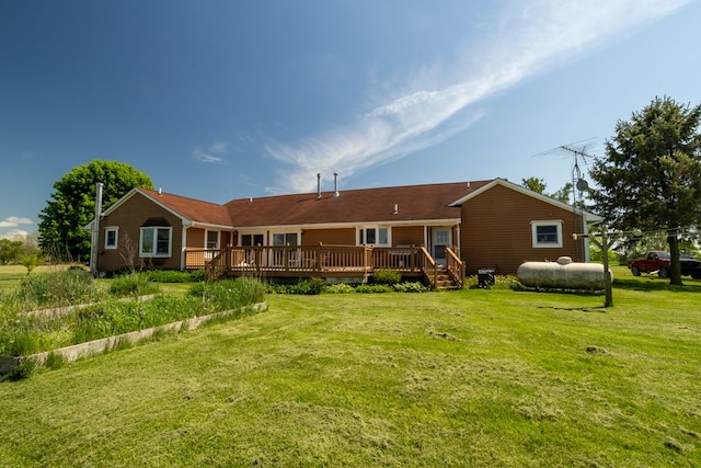 34699 Fuerstenau Rd, Richmond, MI 48062 - back of house featuring a deck and a lawn