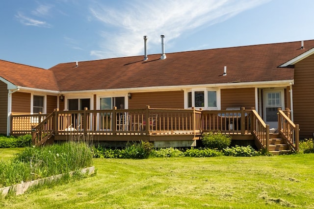 34699 Fuerstenau Rd, Richmond, MI 48062 - back of property featuring a lawn, a deck, and a shingled roof