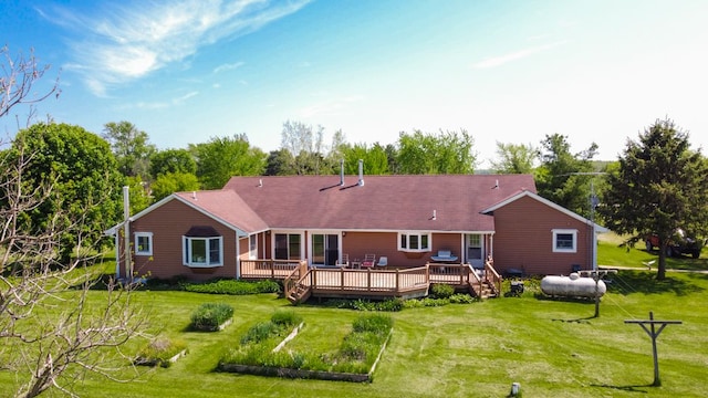 34699 Fuerstenau Rd, Richmond, MI 48062 - back of property featuring a yard and a deck