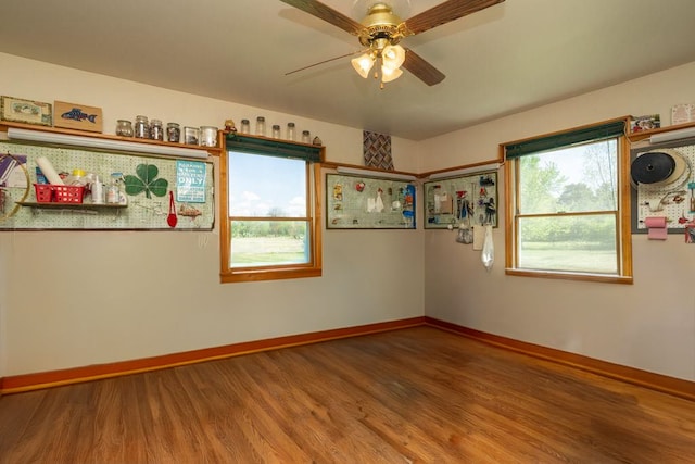 34699 Fuerstenau Rd, Richmond, MI 48062 - spare room featuring wood finished floors, baseboards, and ceiling fan