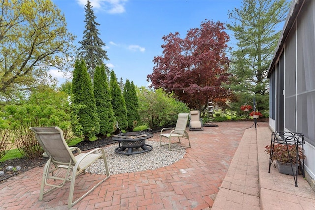 28605 Southpointe Rd, Grosse Ile, MI 48138 - view of patio featuring a fire pit